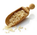 Wooden scoop with brown rice Royalty Free Stock Photo