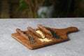 Wooden scoops with chia, black cumin and white sesame seeds close-up. Selective Focus. Royalty Free Stock Photo