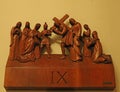 Wooden sculpture of Christ`s disciples and his cross n the Church of our Lady Signora Assunta and Santa Zita