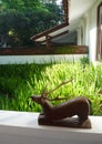 Wooden sculpture on patio Royalty Free Stock Photo