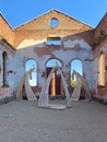 Wooden sculpture in the ruins of the Lutheran church of the Parish of Yakkim. Lahdenpohja city, Republic of Karelia