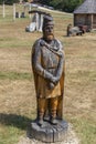 Wooden sculptures with Dacian themes in the Polovragi sculpture camp, Gorj, Romania. Royalty Free Stock Photo