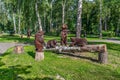 Wooden sculptures of the family of bears in Trostianets central park Royalty Free Stock Photo