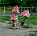 Wooden sculptures mushrooms set as an ornament in the garden Royalty Free Stock Photo