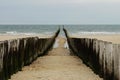 Wooden sea breakers Royalty Free Stock Photo