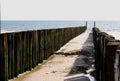 Wooden sea breakers Royalty Free Stock Photo