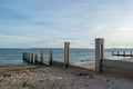 Wooden Sea Defences Protecting a Sandy Beach in Scotland Royalty Free Stock Photo