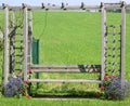 Wooden seating bench in the green