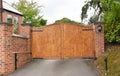 Wooden security gate with keypad lock Royalty Free Stock Photo