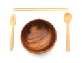 Wooden circle bowl with fork and spoon. chopstick made from bamboo wood isolated on white background. kitchenware equipment handma