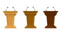 Wooden set of three colored tribunes stand rostrum with microphones. Podium or pedestal stand for speech or public Royalty Free Stock Photo