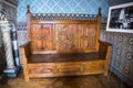 Wooden Settle in the Castello d`Albertis, a historical residence in Genoa