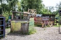 Wooden shack and signpost on adventure playground