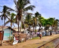 Wooden shacks with people living by the railway tracks, Sri Lanka