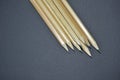 Wooden sharpened pencils on a black background Royalty Free Stock Photo