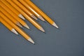 Wooden sharpened pencils on a black background Royalty Free Stock Photo