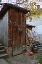 Wooden shed basketball hoop, ball and firewood Royalty Free Stock Photo