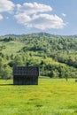 Wooden shed in the field Royalty Free Stock Photo