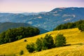 Wooden shed on the grassy hillside