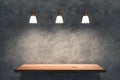 wooden shelf on concrete wall mockup under light front perspective view, blank for design Royalty Free Stock Photo