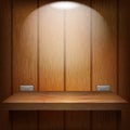 Wooden shelf with metal fixtures hanging on a wood