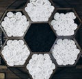 Wooden shelf with towel in form of honeycombs