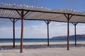 Wooden shelter on the beach near the sea Royalty Free Stock Photo