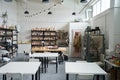 Wooden shelving in pottery workshop with lot of pottery on it Royalty Free Stock Photo