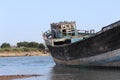 Wooden ship on sea shore