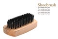 Wooden shoe brush and black bristles with sample text Royalty Free Stock Photo