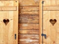 Wooden shutters with hearts. Austria.