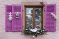 Wooden shutters and window decorated for new year Royalty Free Stock Photo