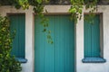 wooden shutters on the windows and doors of the Mediterranean authentic home