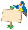 Wooden sign with blue bird Royalty Free Stock Photo