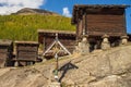 Wooden sign depicting Jesus Christ, citing a Bible quote, in the Swiss Alps