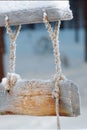 Wooden sign frost-covered