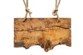 A wooden sign hangs from a rope, providing direction or information Royalty Free Stock Photo
