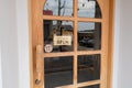 Wooden sign hangs welcome open coffee shop