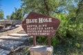 The wooden sign inform about the Blue Hole, the famous deep pool. Santa Rosa, New Mexico, US