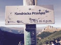 A wooden sign in the Polish Tatras points to Kondracka Przelecz - POLSKA - POLAND