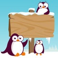 Blank wooden sign on a winter landscape with penguins. Vector Illustration