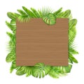 Wooden sign with tropical leaves