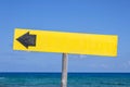 Wooden signboard on the beach Royalty Free Stock Photo