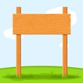 Wooden signboard in grass isolated on grass sky background. Signs board and symbols to communicate a message on street