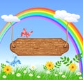 Wooden signboard hanging on rainbow