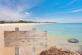 wooden signboard on tropical beach for summer background. Royalty Free Stock Photo