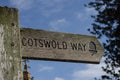 Wooden signpost for the Cotswold Way footpath