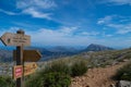 Wooden signpost for hikers in Mallorca along the GR 221