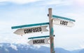 Wooden signpost with various choices Royalty Free Stock Photo