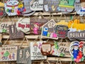 Wooden signs for sale in gift shop at Chinese New year Vietnam